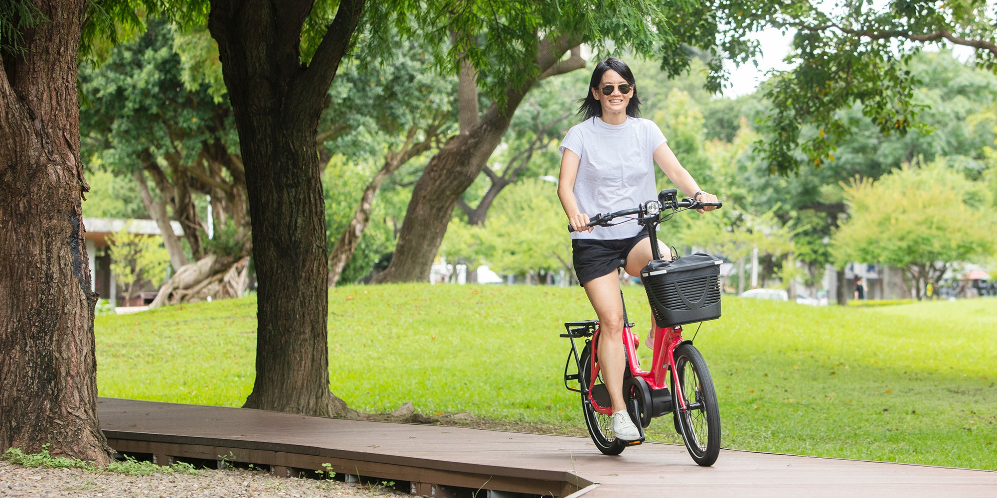 Woman riding Tern NBD e-bike