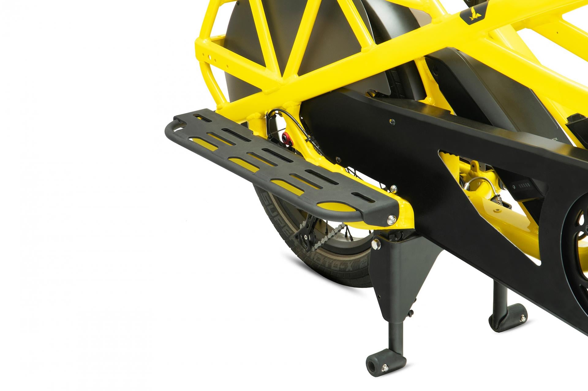 Black Sidekick Wide Decks attached to a yellow Tern electric bicycle, providing extra foot space for passengers.