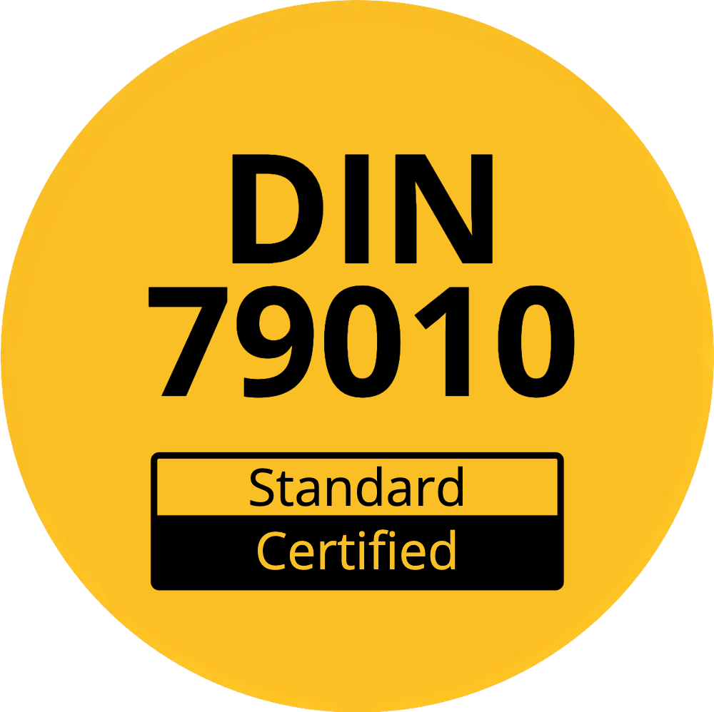 DIN 79010 certification label on a yellow background