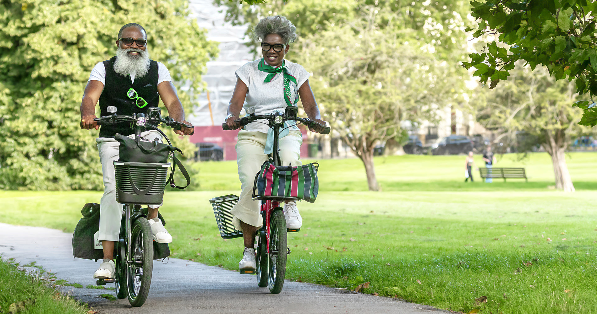 Older couple riding Tern NBD e-bikes