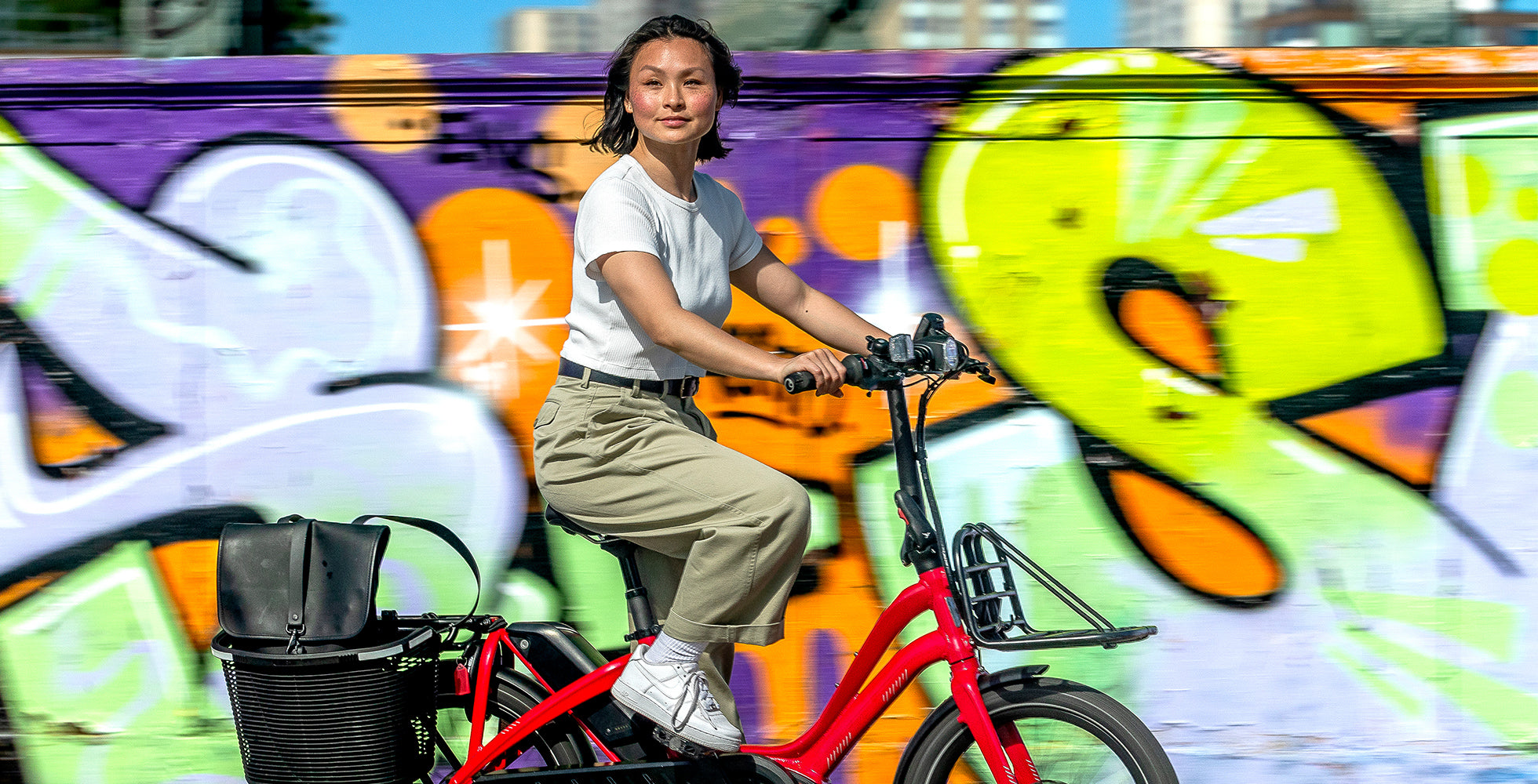 Woman riding Tern NBD e-bike